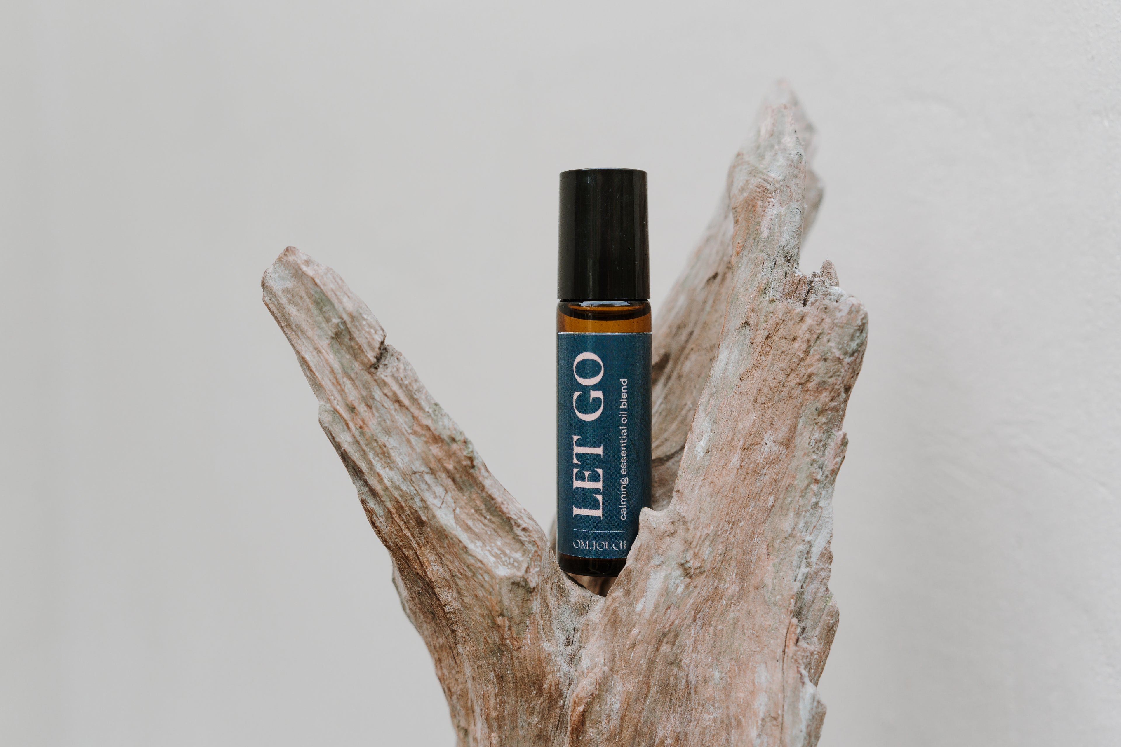 om.touch calming essential oil blend LET GO - elevates your moments of tranquility and relaxation